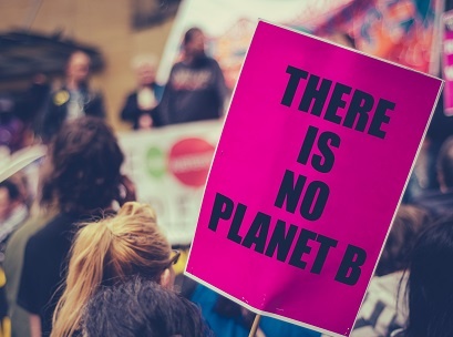 Image of a sign about climate change at a protest