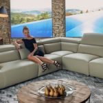 Image of woman lounging on sofa