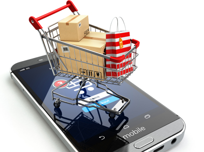 Online shopping concept. Mobile phone or smartphone with cart an