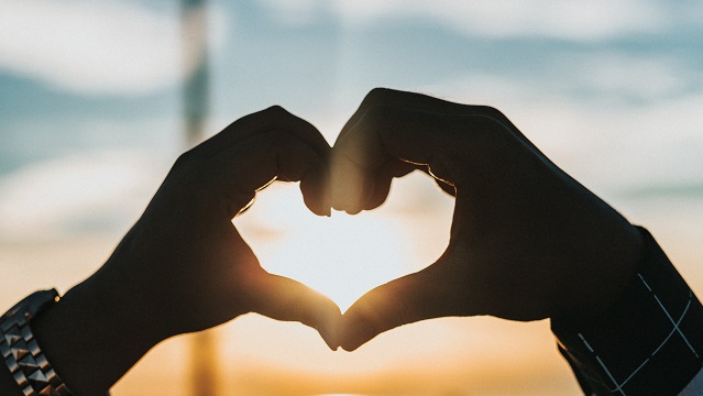 Image of two hands forming the shape of a heart