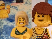A man at the beach made of Lego