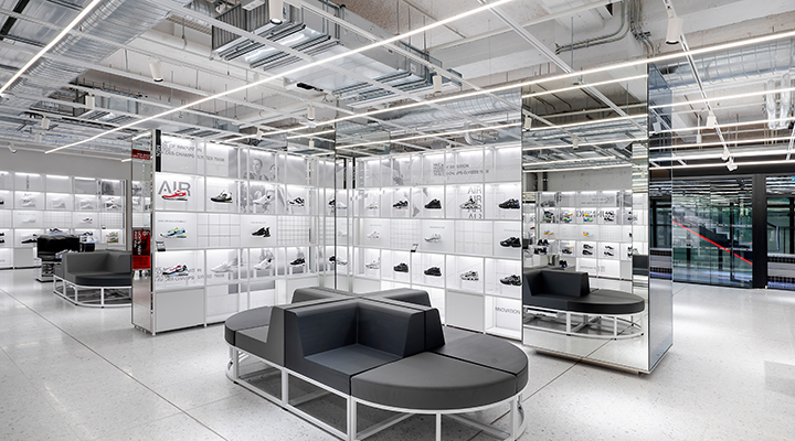 White shelving with the latest Nike shoes at the Nike House of Innovation.