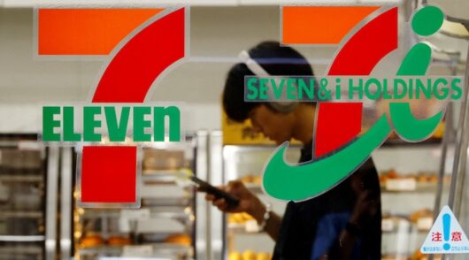 Japan's Seven & I’s logo is seen at its 7-Eleven convenience store in Tokyo.