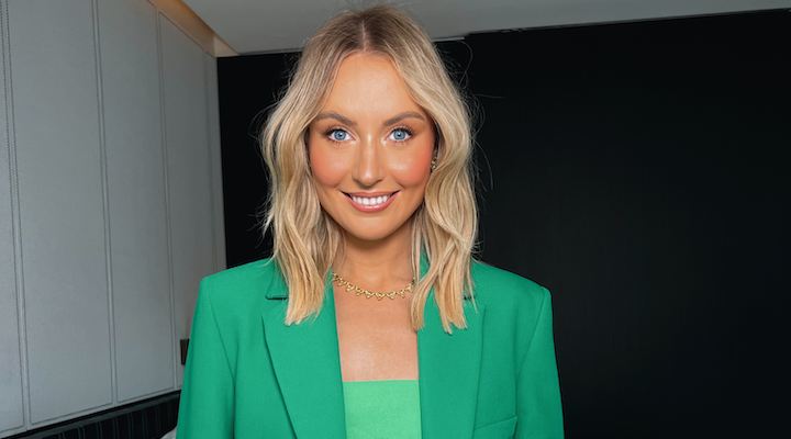 TBH Skincare co-founder Rachael Wilde smiling and wearing a green blazer