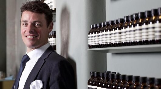 Michael O'Keeffe standing in an Aesop store