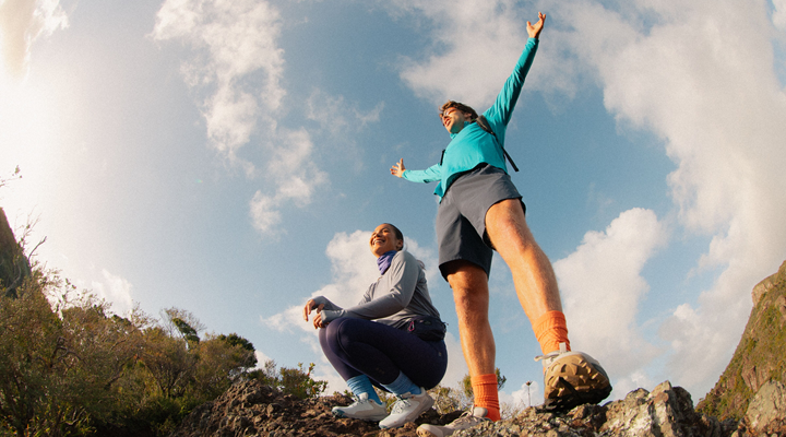 Kathmandu campaign image showing two hikers photographed from a low angle