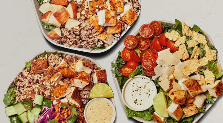 three bowls of sweetgreen salads