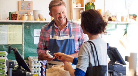 Image of people at store checkout.