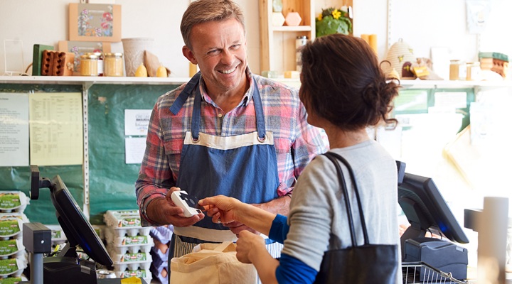 Image of people at store checkout.