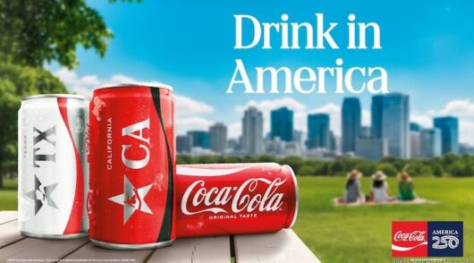 A line-up of Coca-Cola products against a park and city landscape.
