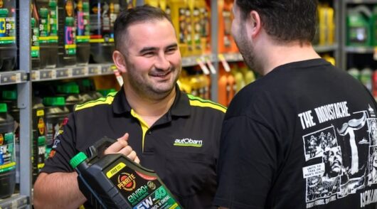 Image showing Autobarn staff in store with customer
