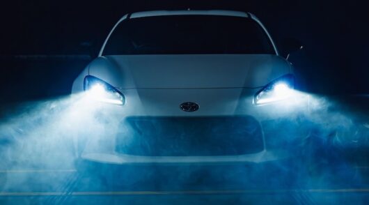 Image of car with headlights on